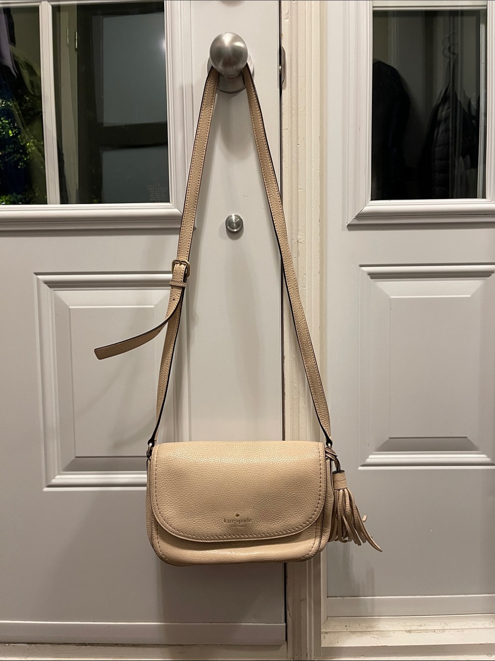 kate spade beige pebbled leather crossbody with tassel